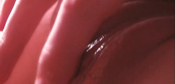  cum between her labia. Close-up
